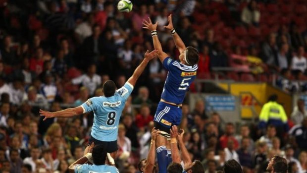 Waratahs captain Dave Dennis competes for a lineout ball against Stormers second-rower Michael Rhodes.
