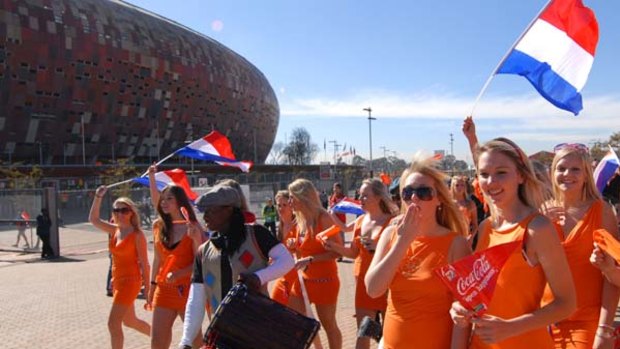 The group of women, pictured outside Soccer City stadium.