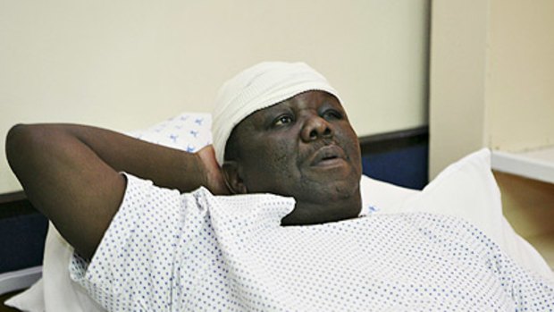 Zimbabwe's Prime Minister Morgan Tsvangirai lies in a hospital bed in Harare.