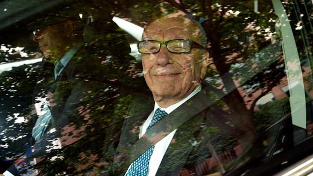 Rupert Murdoch leaves the HWT building in Southbank yesterday.