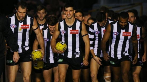 Leader of the pack: Magpies captain Scott Pendlebury (centre) has impressed coach Nathan Buckley.