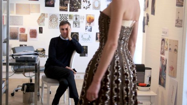 <i>Dior and I</i>: Creative director Raf Simons with a model.
