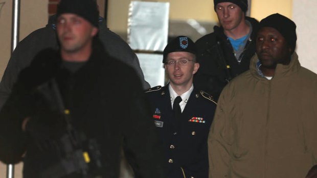 Bradley E. Manning is escorted from a hearing last week.