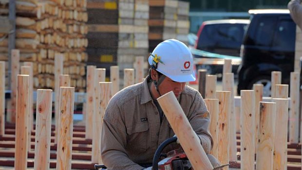Reconstruction begins ... Workers begin building temporary housing in the devastated town of Rikuzen-Takata.