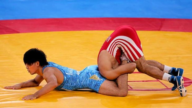 Head in the sand ... Wrestling officials did not lobby for the sport to stay in the Olympic because they did not realise it was in danger of being removed.