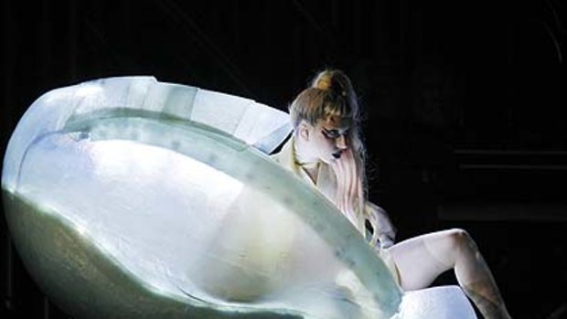 Lady Gaga steps out of her egg.