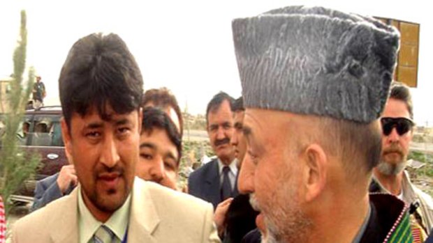 Akram Sayed with Afghan President Hamid Karzai.