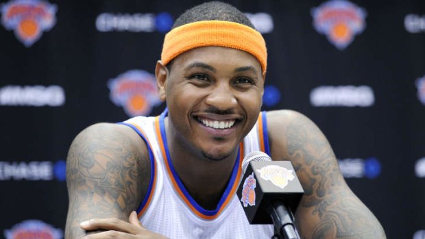 Smiling dial: New York Knicks forward Carmelo Anthony talks to the media at NBA teams media day.