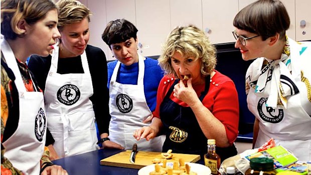 Moment on the lips ... Nelleke Gorton judges creations by, from left, Kelly Doley, Kate Blackmore, Frances Barrett and Diana Smith.