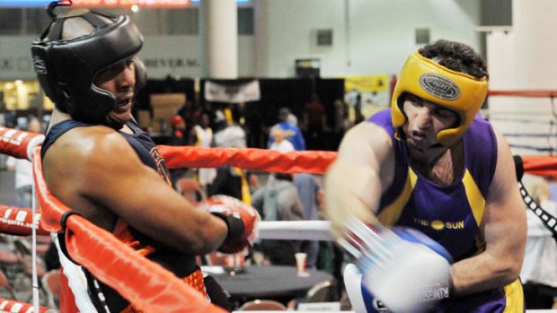 Tamerlan Tsarnaev (right) lands a blow during a golden gloves tournament in 2009. Tsarnaev was considered very polished and relaxed for a young fighter.