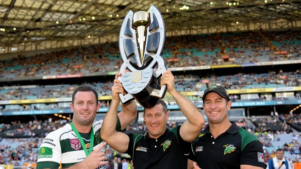 Family affair: Chris Walker, Ben Walker, Shane Walker with the trophy.