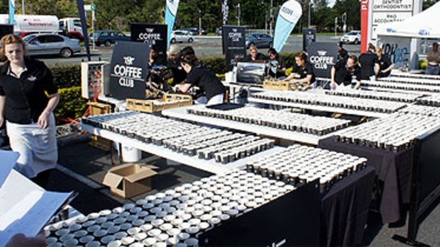 Twenty Brisbane baristas have broken the world record for the most espressos made in one hour.