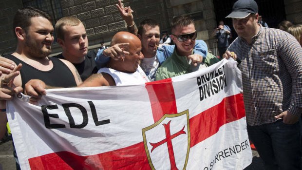Targets: Members of the English Defence League rally outside the Old Bailey.