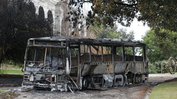 An arson attack at Salesian College resulted in a burned out bus as well as fire damage to parts of the school building, on August 10, 2014 in Sunbury, Australia. 