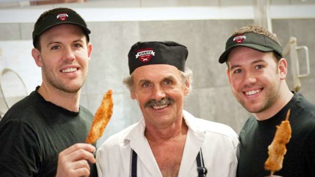 Roman Dyduk (pictured with sons Tom (left) and Andrew, opened his first schnitzel restaurant way back in 1975.