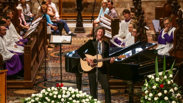 Tim Rogers of You Am I performs at the funeral service for Stevie Wright at St Andrew's Cathedral in Sydney. 