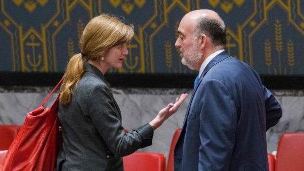 The US ambassador to the United Nations, Samantha Power, speaks with Israel's UN ambassador Ron Prosor, before a midnight meeting of the UN Security Council.