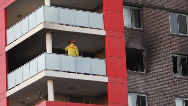 The charred surround of the fire-damaged unit.