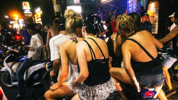 Australian schoolies live it up in Bali’s party street, Jalan Legian. Other schoolies, not pictured, say they are still taking magic mushrooms.