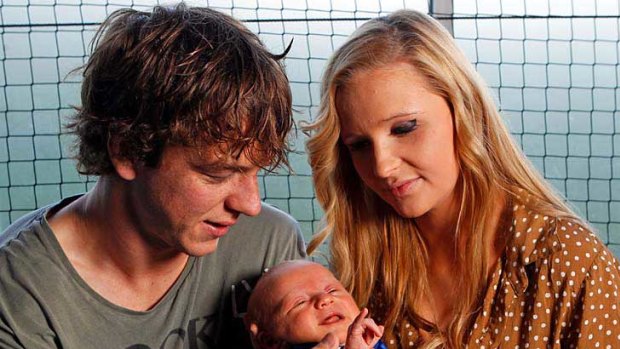 Western Bulldogs midfielder Liam Picken and partner Annie Nolan, with their four-week-old son, Malachy.