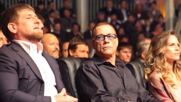 Guests &#8230; Mr Kadyrov, left, with Van Damme and Swank. Photo: AFP