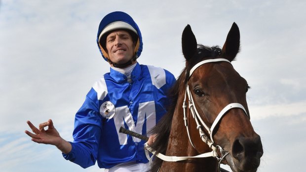 Hugh Bowman on Winx after winning the Cox Plate in October last year. 