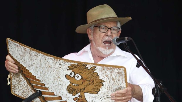 Rolf Harris performs with his wobbleboard at the Glastonbury Festival in England last year.