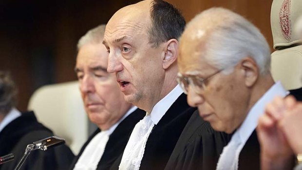 Whaling must cease: ICJ president Peter Tomka (centre).