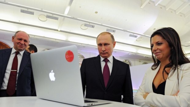 Russian President Vladimir Putin and the editor-in-chief of RT, Margarita Simonyan.