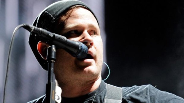 Blink-182 singer/guitarist Tom DeLonge denies quitting the band.