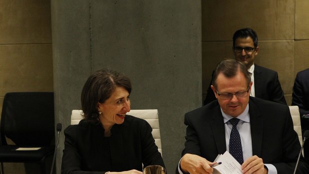 NSW Treasurer Gladys Berejiklian next to Rob Whitfield, Secretary of NSW Treasury.