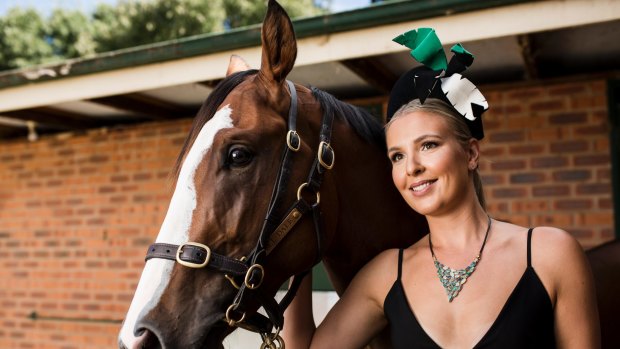 Thoroughbred Park Racing Ambassador Kate Speldewinde sported the ultimate accessory for this weekend's Black Opal Stakes - a $25,000 neckpiece comprising Lightning Ridge black opals made by Vangeli Manufacturing Jewellers in Woden, Canberra-trained 2-year-old colt Mossman Gorge will be racing in the Black Opal Stakes on Sunday.. 
