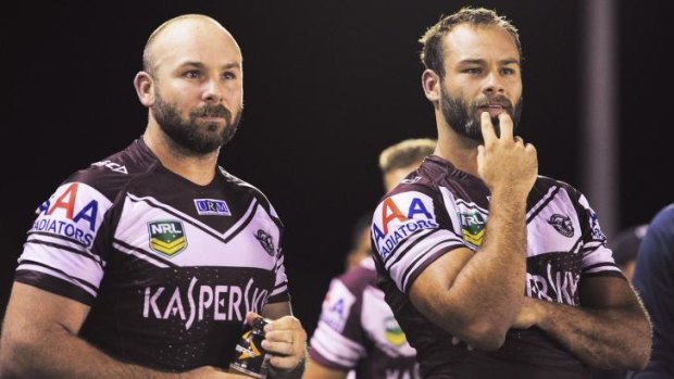 Brothers in arms: Brett Stewart (right) may follow his brother Glenn, who has signed with South Sydney, out of Manly.