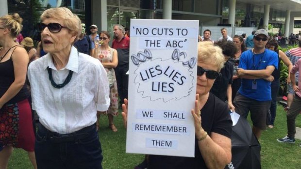 Protesters angry about the Federal Government's cuts to the ABC gather in Brisbane.