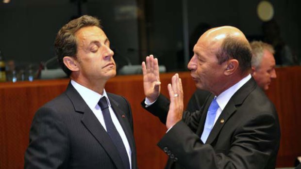 Talks ... the French President, Nicolas Sarkozy, left, and Romania's President, Traian Basescu, before the EU summit.