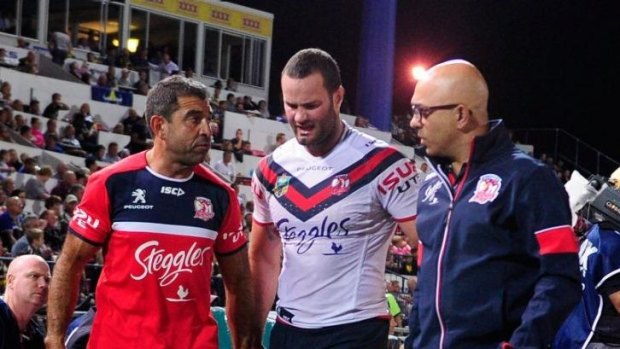 Setback: Roosters back-rower Boyd Cordner battles the pain of a high ankle sprain as he leaves the field on Saturday night.