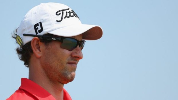 Still in it: Adam Scott looks on at the 11th hole during his second round at Royal Liverpool.