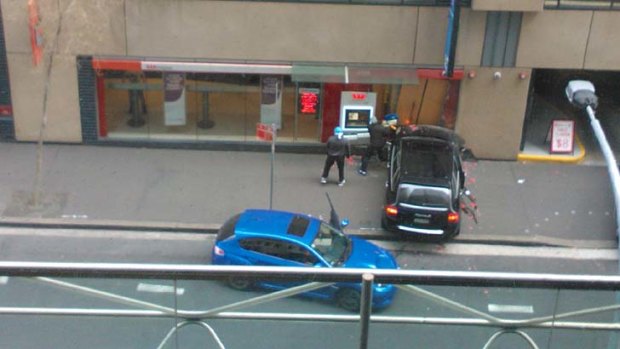Daylight robbery: the thieves rammed a car into the Westpac branch.