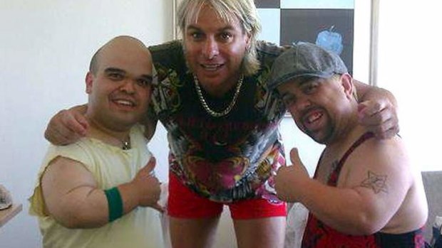 Burnt: Blake Johnston, right, former footballer Warwick Capper, centre, and a fellow 'Dwarf My Party' entertainer.