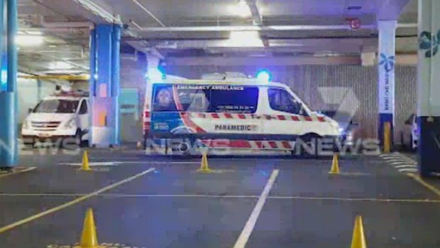 An ambulance leaves Fountain Gate shopping centre car park on March 27.