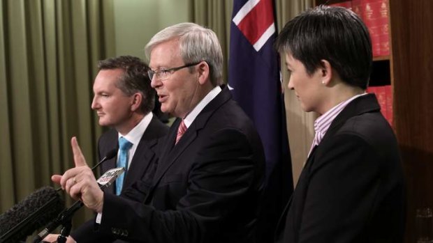 Chris Bowen, Kevin Rudd and Penny Wong during last week's ill-fated costings media conference.