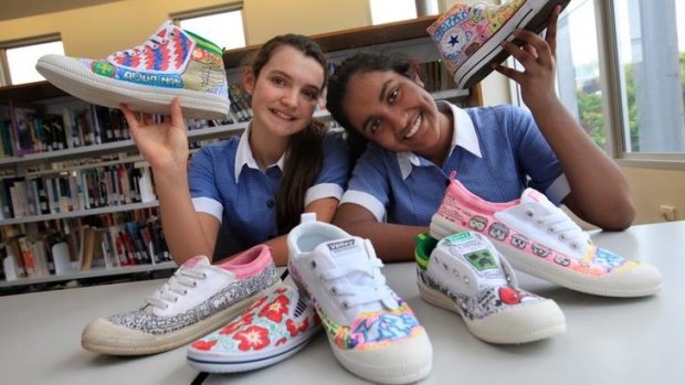 Meg Richards (left) and Tara Naidu, who design graffiti shoes.