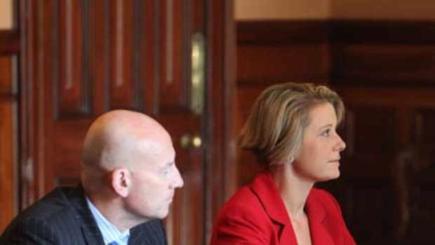 Labor pains... the new Minister for Transport John Robertson and Premier Kristina Keneally.
