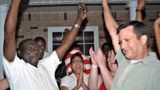 Mayor James Young, left, celebrates his election victory.