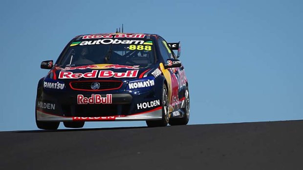 Craig Lowndes drives the #888 Red Bull Racing Australia Holden during practice for the Bathurst 1000.