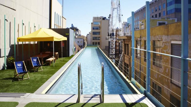 Iconic ... the Adelphi's 25-metre glass-bottomed lap pool that juts out over Flinders Lane.