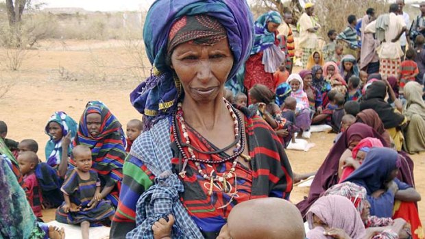 Refugees wait to go to a camp in the Ethiopia as drought strengthens its grip on countries in the Horn of Africa
