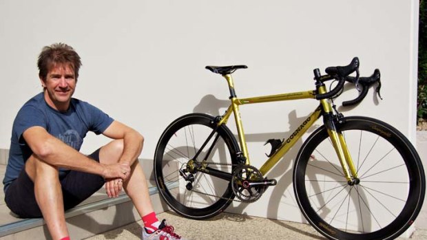 Wild ride &#8230; Urban Cycles' Craig Klement with a $17,000 gold-coloured Colnago C59 Ottanta.