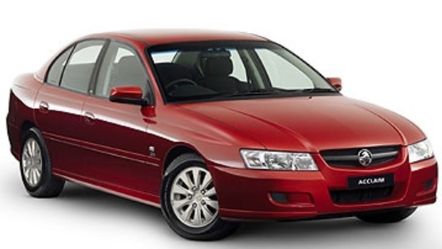 An image of a red Commodore similar to the one allegedly used in the robbery.
