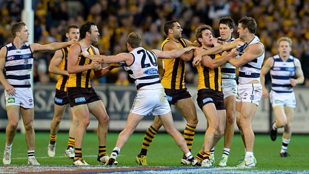 Hawthorn and Geelong don't hold back in the 2013 preliminary final.